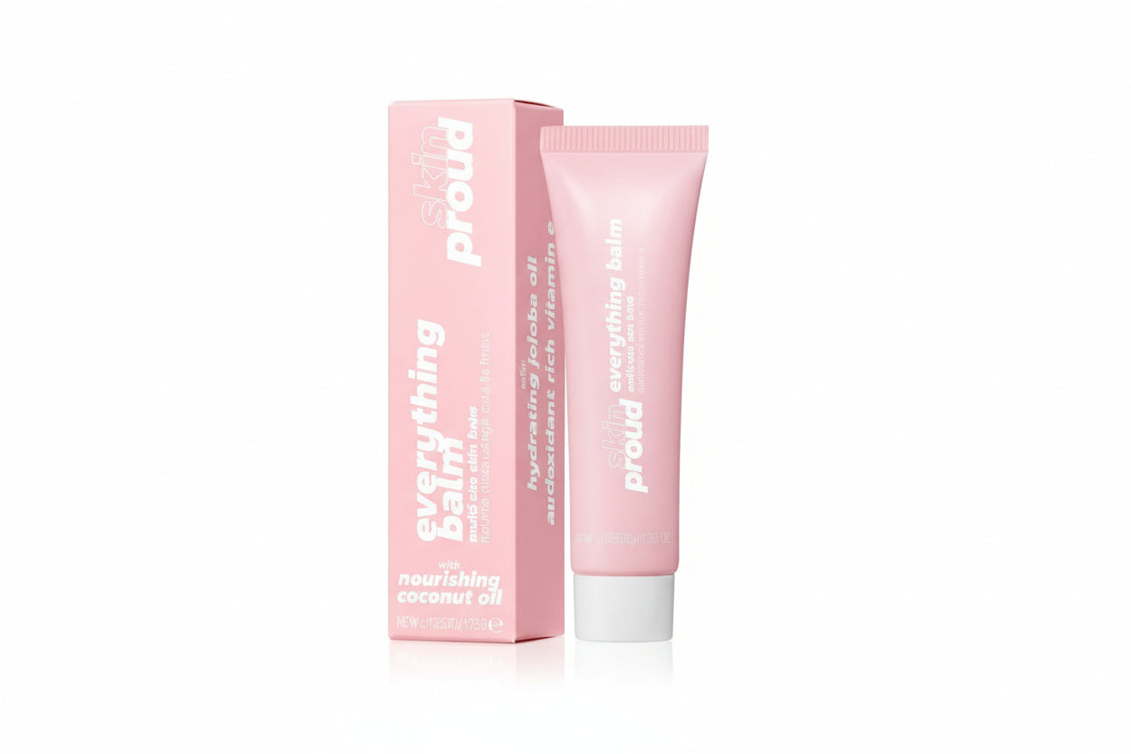 Pink tube and box of a skincare product on a white background