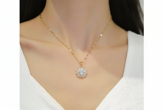 Gold necklace with a diamond pendant on a mannequin
