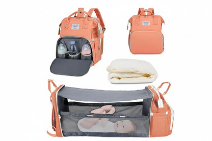 Peach-colored backpack with baby items including bottles, blanket, and baby in a crib.
