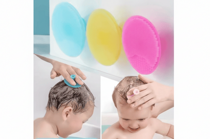 Colorful baby massage brushes with a child using them for头部按摩.