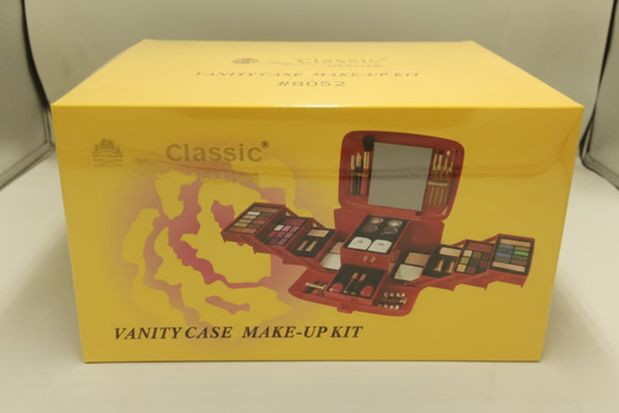 Make-up kit packaging with yellow box and pink makeup items on a white background