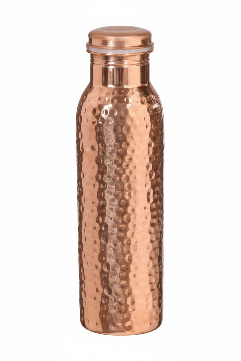 Copper water bottle with a textured surface on a white background