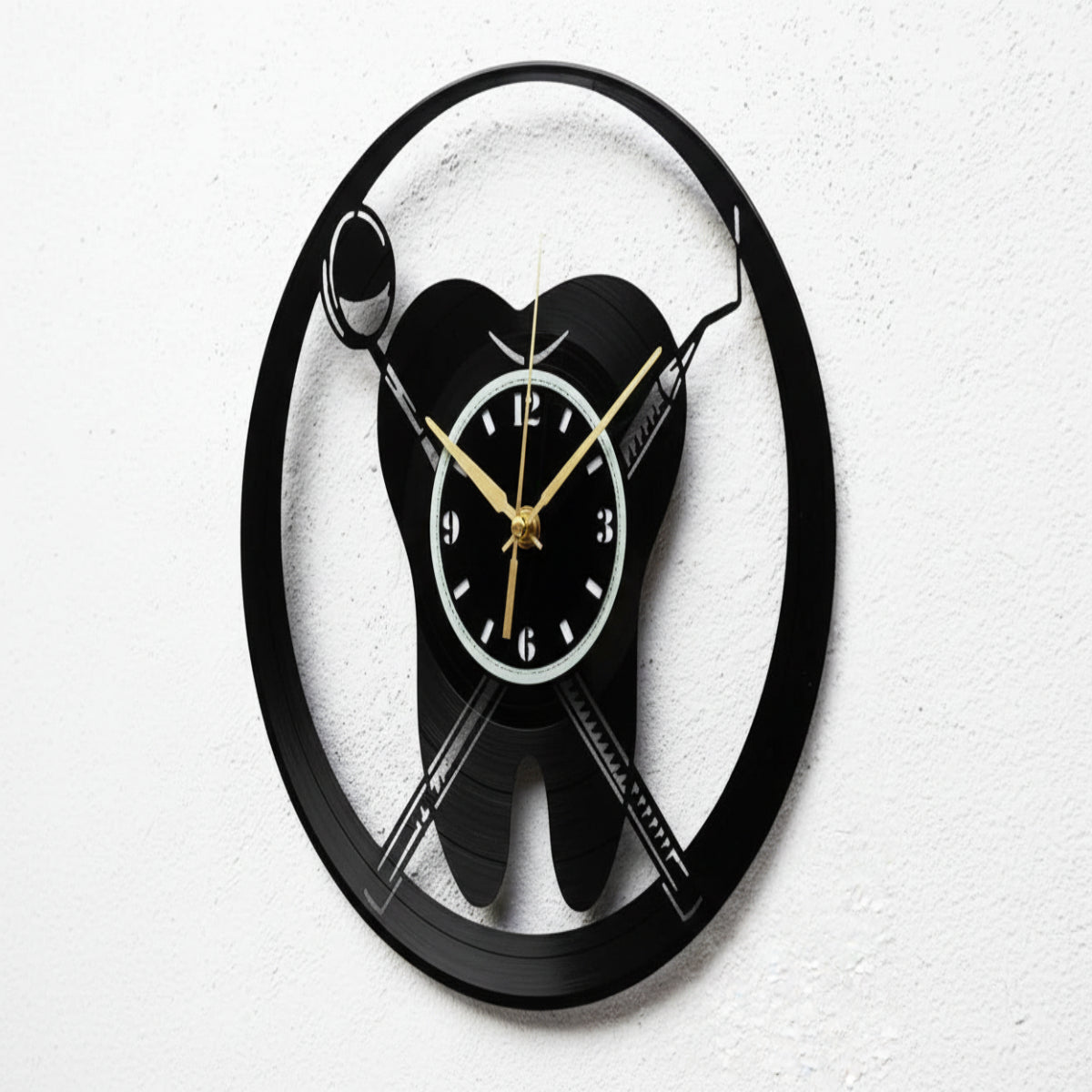 Wall clock with a black and white design on a white background