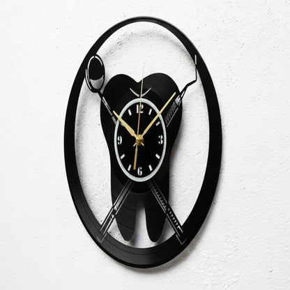 Wall clock with a black and white design on a white background