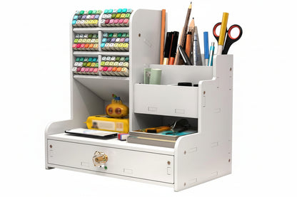 White desk organizer with stationery items including pens, markers, and a small plant.