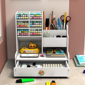 White desk organizer with stationery items in a room setting