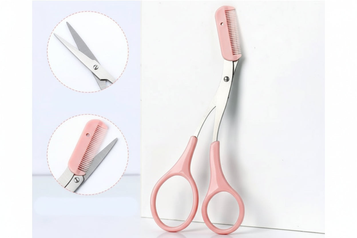 Pink pet grooming scissors and comb set on a light gray background