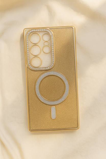 Gold phone case with diamond-studded design on a beige fabric background