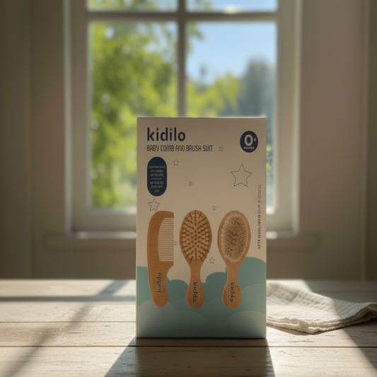 kidilo baby comb and brush set packaging on a wooden surface with a window in the background