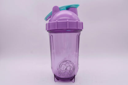 Purple tumbler with a straw on a light purple background