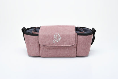Pink pet carrier with a logo on a white background