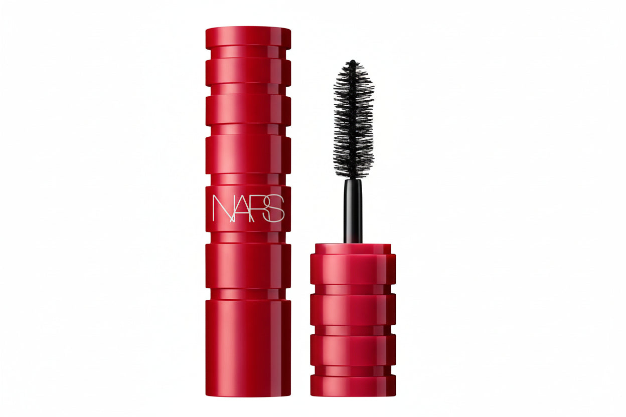 Red NARS mascara with black brush on a white background