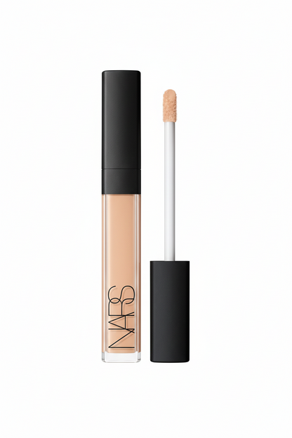 NARS concealer with applicator on a white background
