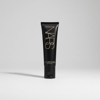 Black NARS tube on a white background