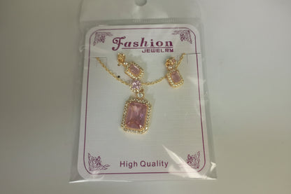 Jewelry set with pink pendant and gold accents on a 'Fashion Jewelry' card.