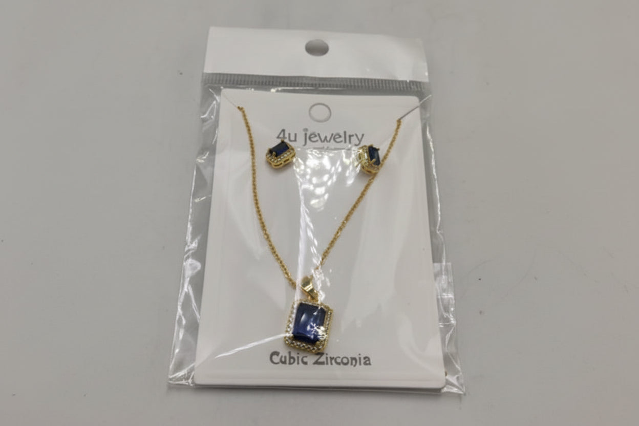 Jewelry set with necklace and earrings on a '4u Jewelry' card, featuring cubic zirconia stones.