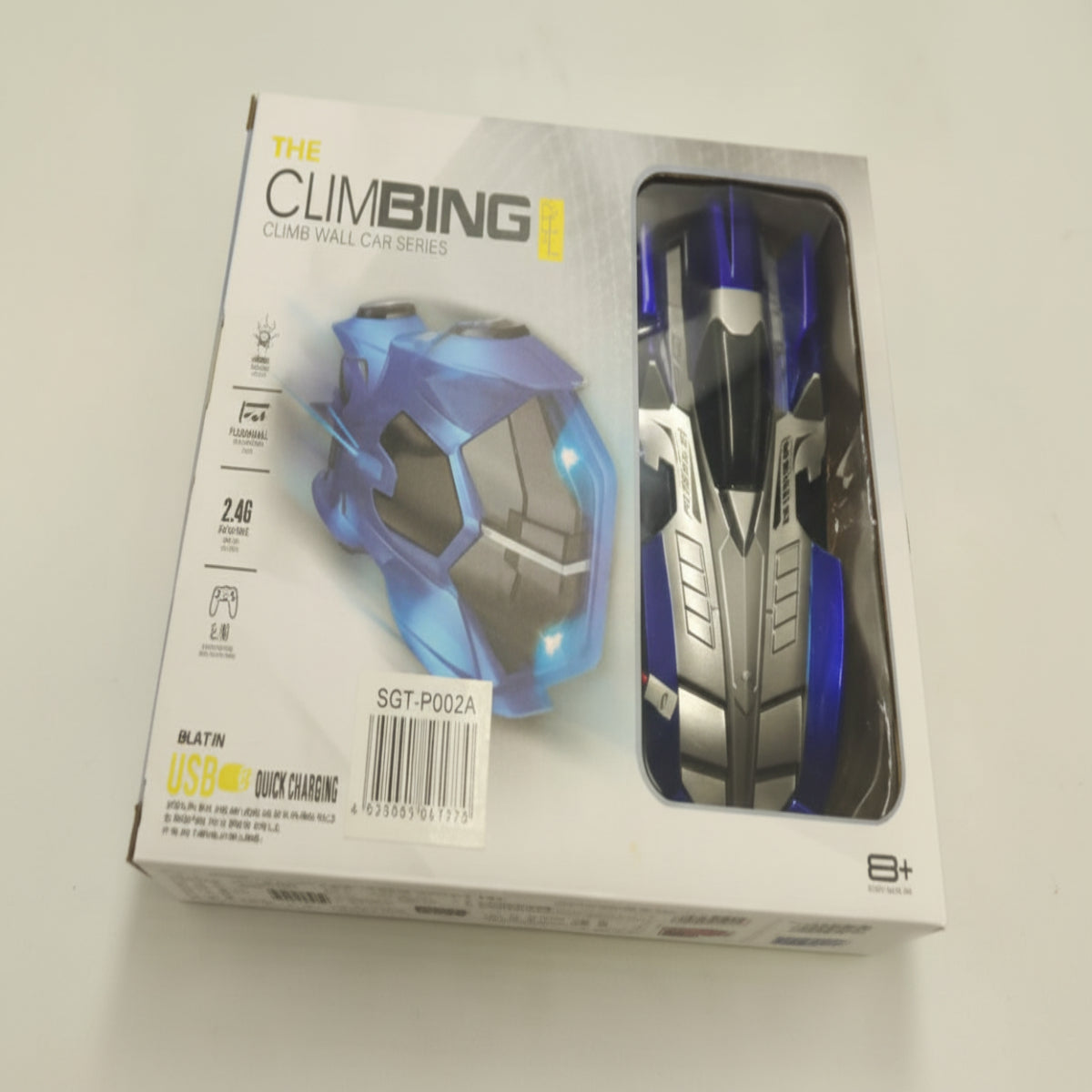 Box packaging of a toy car with 'The Climbing' branding on a white background