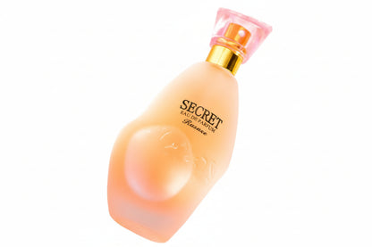 Perfume bottle labeled 'Secret' on a white background