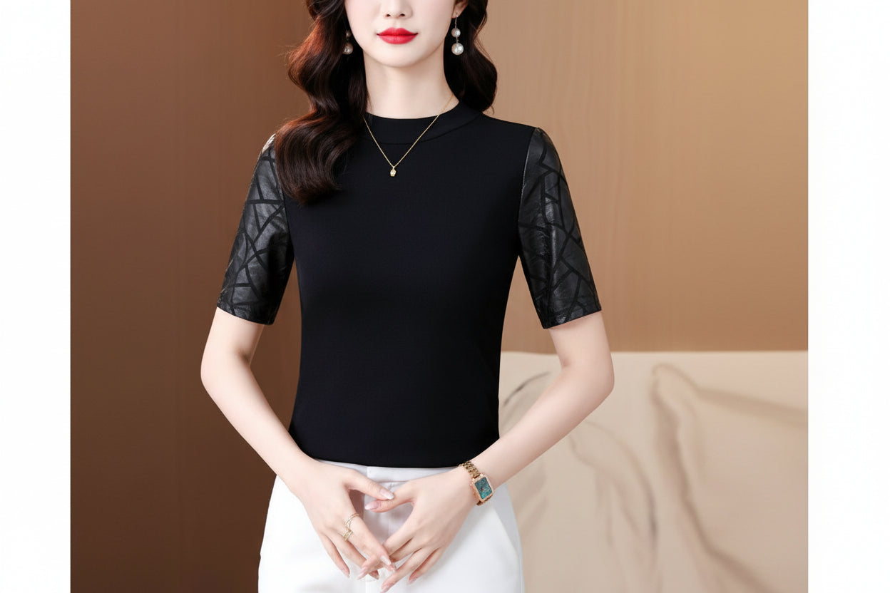 Woman wearing a black top with sheer sleeves against a brown background
