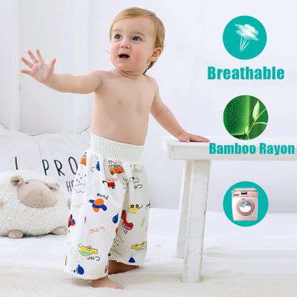 Child wearing colorful pants with cartoon designs, standing in a room with text about breathable bamboo rayon and machine washability.