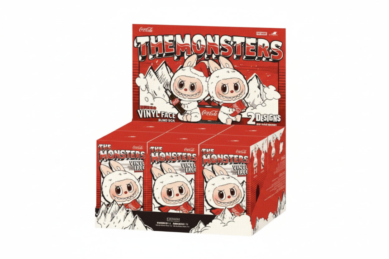 Box of 'The Monsters' vinyl figures with Coca-Cola branding on a white background