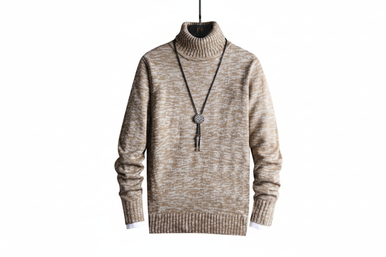 Beige turtleneck sweater with a necklace on a white background