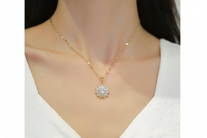 Gold necklace with a diamond pendant on a mannequin